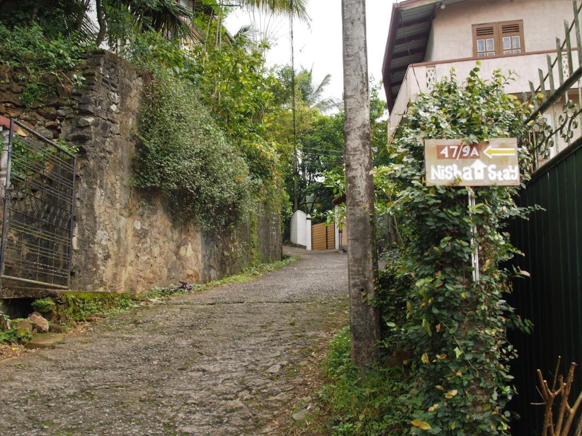 Nisha Homestay Inn Peradeniya Bagian luar foto